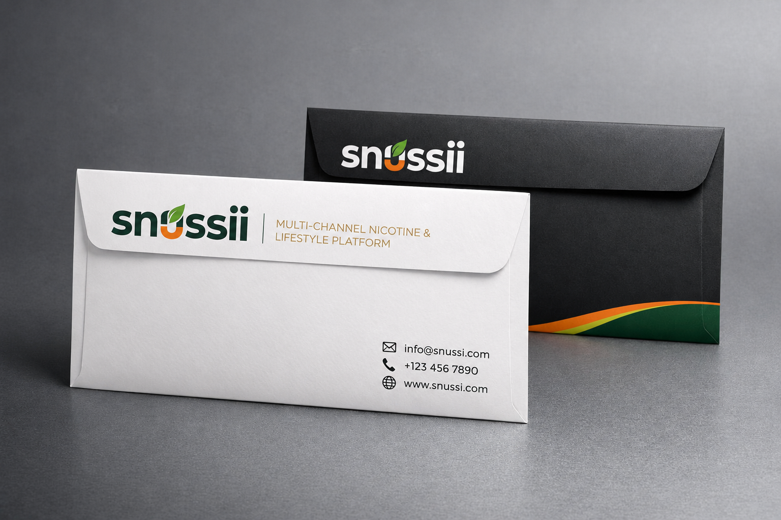 SNUSSI branded envelopes in white and black variants with logo on flap and contact information